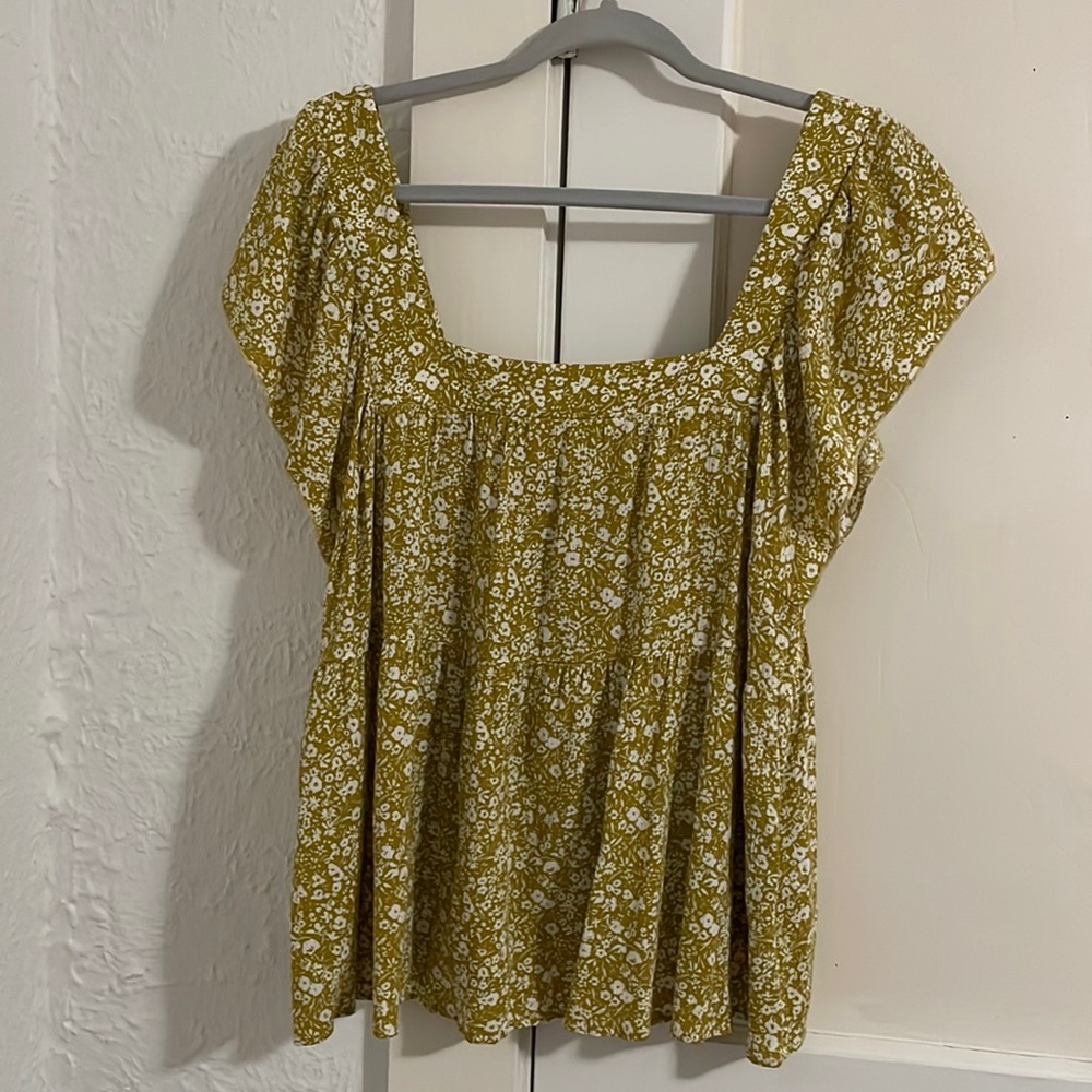 A green-yellow and white boutique floral blouse.